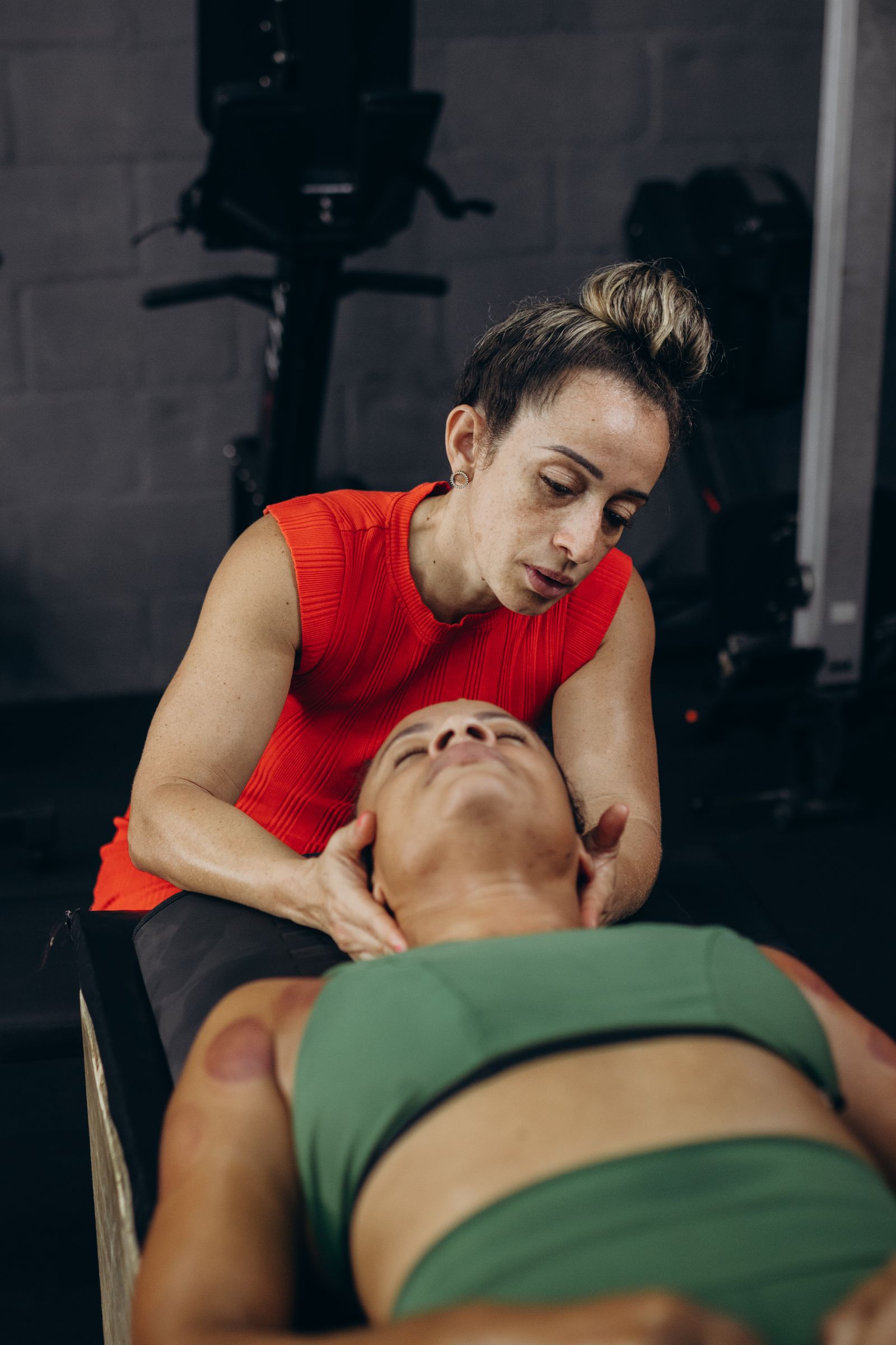 Practitioner providing hands-on neck and shoulder care